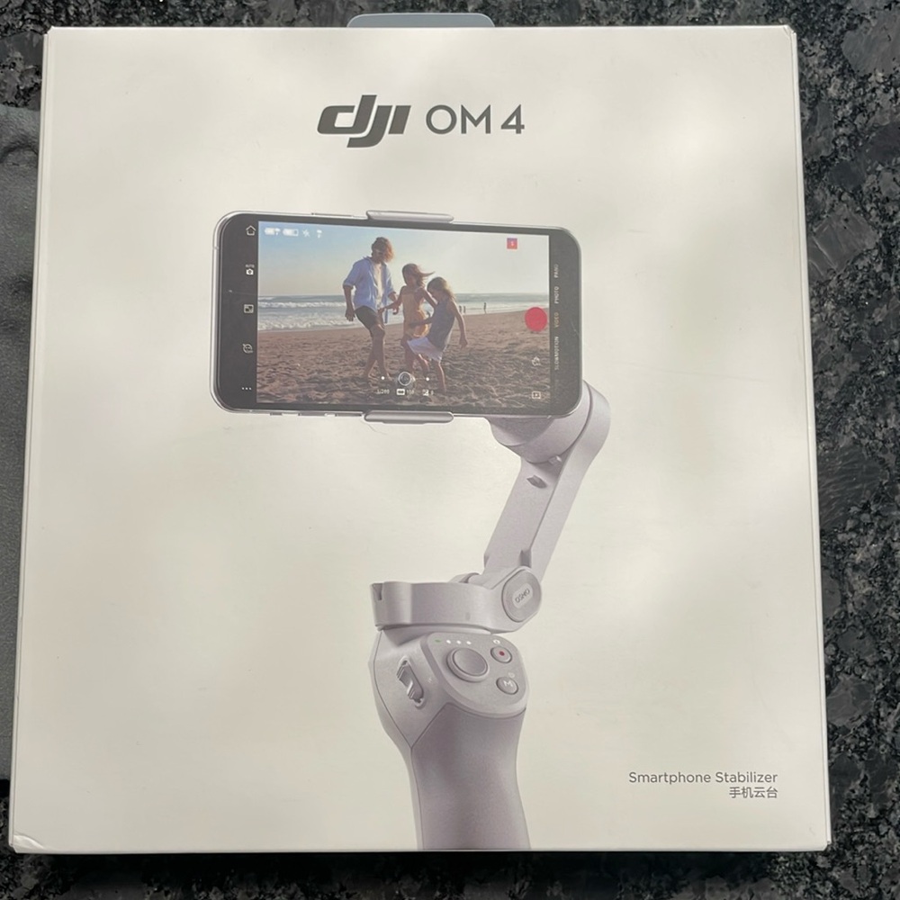 DJI OM 4 with box. Lightly used, like new!
